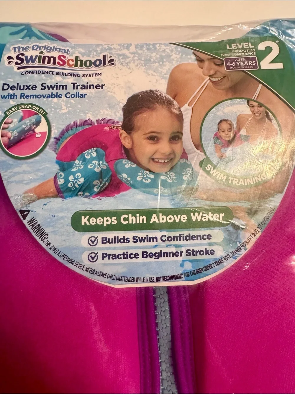 New in Package SwimSchool Pink & Blue Kids Swim Trainer Vest, Size 4-6 years.
